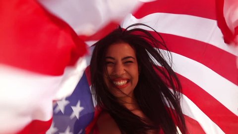 Girl with american flag (close up)の動画素材