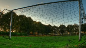 Clouds passing over football goals, HD motion time lapse clip, high dynamic range imaging