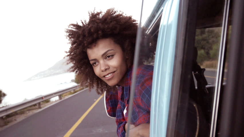 African American Girl Enjoying the road trip