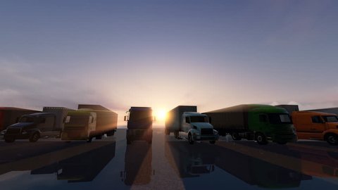 Row of trucks on a parking lot at a sunset