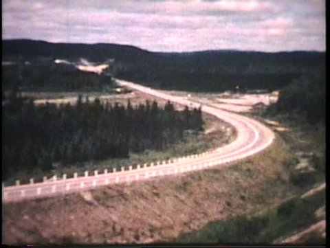 A family stops at a local attraction as they travel across Canada on their holidays. (Vintage 8mm film)