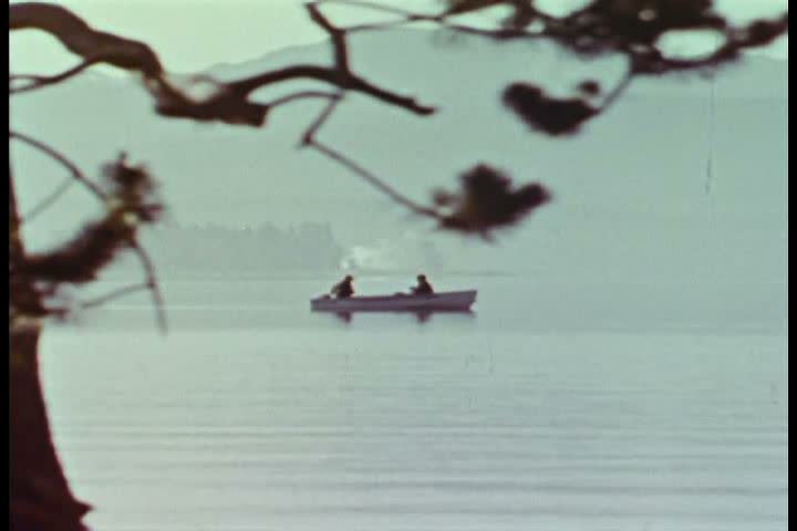CIRCA 1970s - Fishing and birdwatching in the summer at Yellowstone National Park.