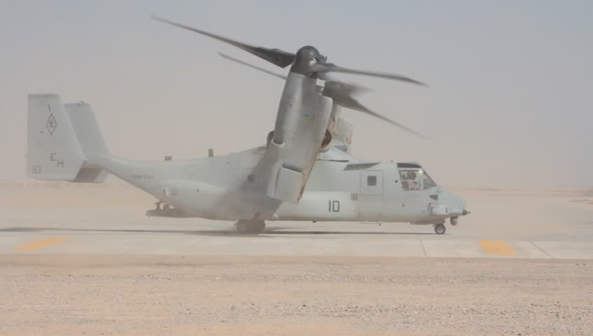 Closeup of US Marine V-22 Osprey idling on tarmac