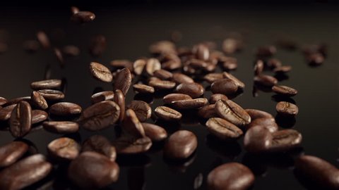 Coffee beans flight. High quality slow motion coffee beans flight. Best for your commercial movie or presentation.