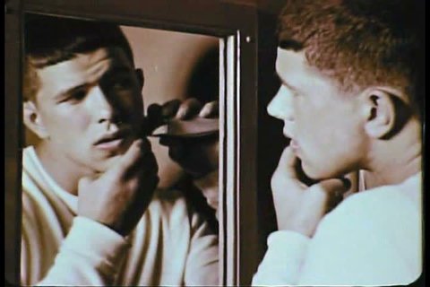 CIRCA 1950s - This 1950s film displays a young man shaving and a young woman concerned about her weight as they grow through puberty