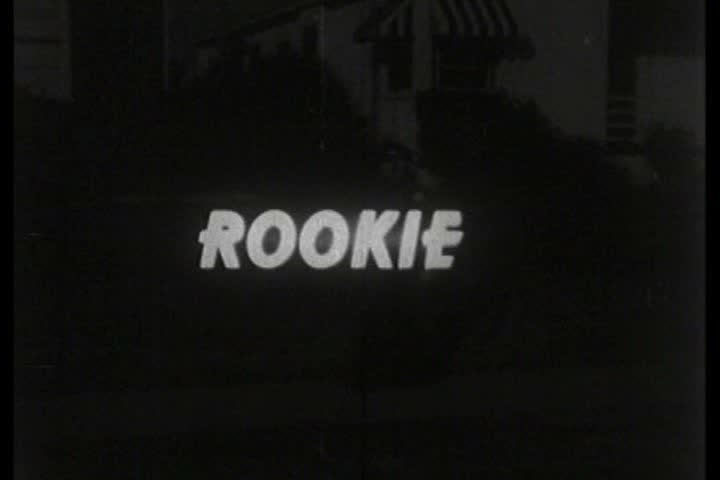 CIRCA 1940s - A rookie police officer patrols a local neighborhood to keep you safe during the 1940s