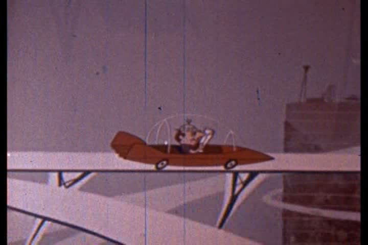 CIRCA 1950s - A man drives home and eats dinner with his family in this 1950s animated film about the future