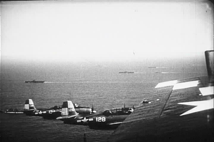 CIRCA 1940s - Good POV shots from airplanes of strafing and bombing runs against Japan in World War Two.