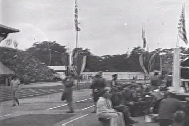 CIRCA 1910s - Troops march on an outdoor field in 1919.
