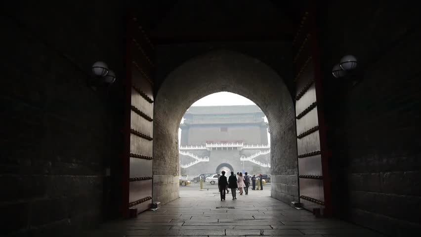 tourist pass ancient city gate tower & arch in beijing china. gh2_04892