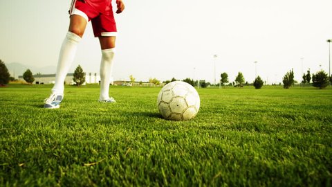 Medium Shot Close Up Two soccer players playing soccer on field, Orem, Utah, USA