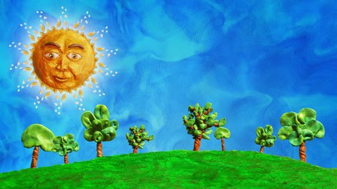 Clay swaying trees with funny sun, loop, HD. Stop motion