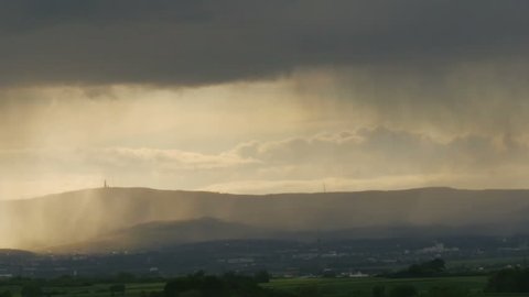 Pan over landscape. Bad weather conditions across the country - 4K downscaling to 1080p