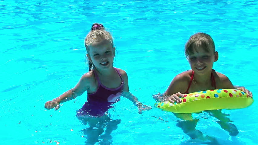 children sitting on inflatable ring swimming Stock Footage Video (100% ...