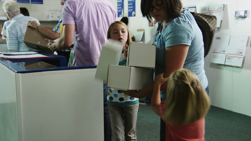 Medium Shot People waiting in line at post office, two daughters (4-11) pulling on mother