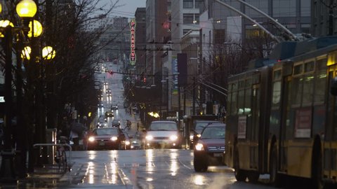Seattle, Washington, USA - March 20, 2011 - Wide Shot Traffic on street at dusk 