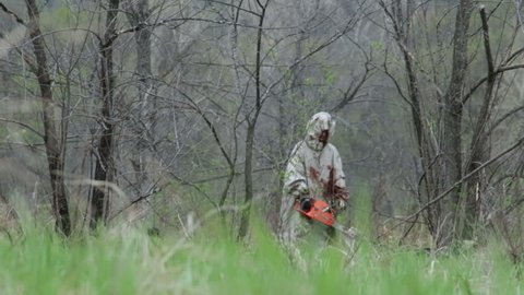 Maniac with a Chainsaw out of the woods for Hunting