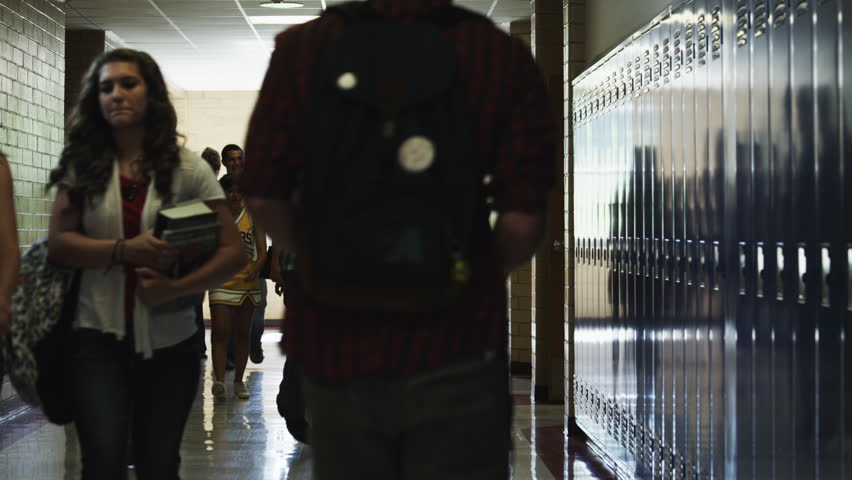 Medium Shot Student bullying frien (14-17) in school corridor Royalty-Free Stock Footage #6331331