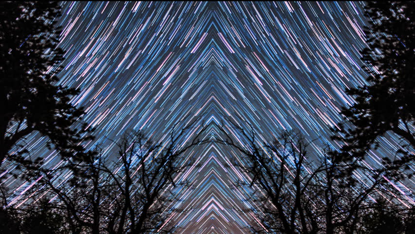 Night Sky Timelapse Star Trails Formed into Native American Spiritual design. Shot in Grand Canyon National Park. Unique psychedelic look at galaxy cosmos. 