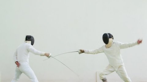 People practicing, men, athletes, sport, fencing duel. Olympics. 8of26