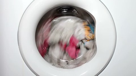 Washing machine working with laundry