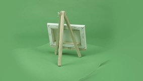 blank canvas isolated on chroma green screen background - Powered by Shutterstock - Get 15% off with code: PIKWIZARD15