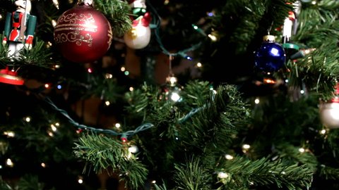Christmas tree ornaments dolly into tree