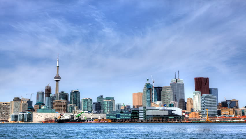 4K UltraHD A timelapse view of Toronto skyline across the water, Canada