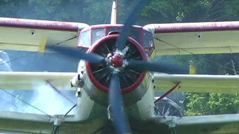 AN-2 aircraft stands at the airport before takeoff and the engine warms
