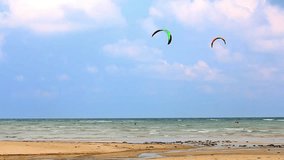 Kite surfing. Man on a parachute surfing