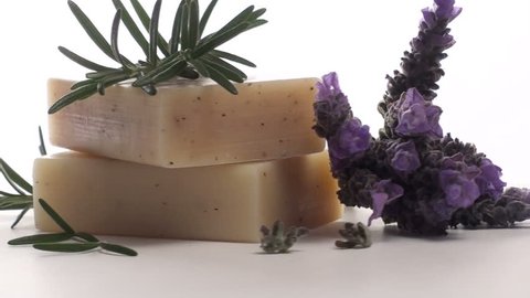 Seamless loop of organic herbal soap fresh lavender and rosemary isolated on white V1