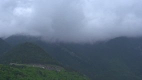 Rain clouds over mountains. Timelapse. Time lapse Stock video footage 1080p