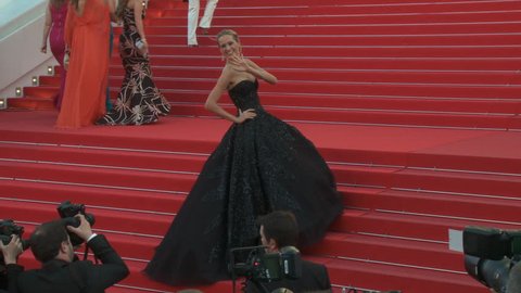 CANNES, FRANCE - MAY 2014: Petra Nemcova on the red carpet steps, shot of black strapless Zuhair Murad gown, for the premiere of "Deux Jours, Une Nuit" at the 67th Cannes Film Festival.