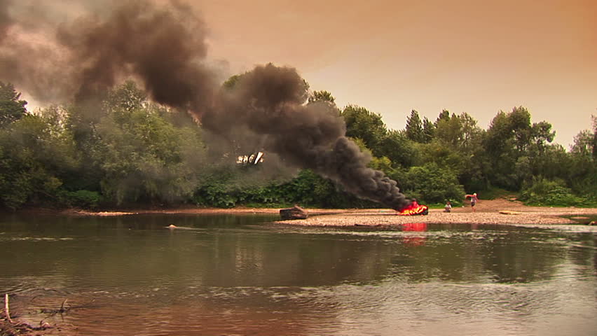 A fire on coast of the river
