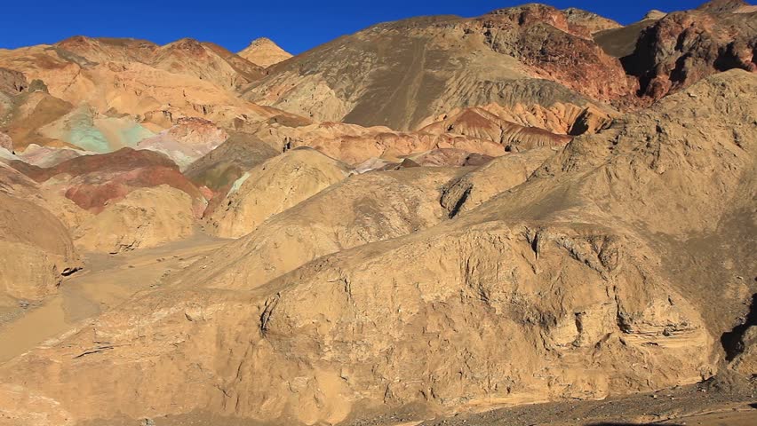 The variegated slopes of Artists Palette in Death Valley, California. Various mineral pigments have colored the volcanic deposits found here.