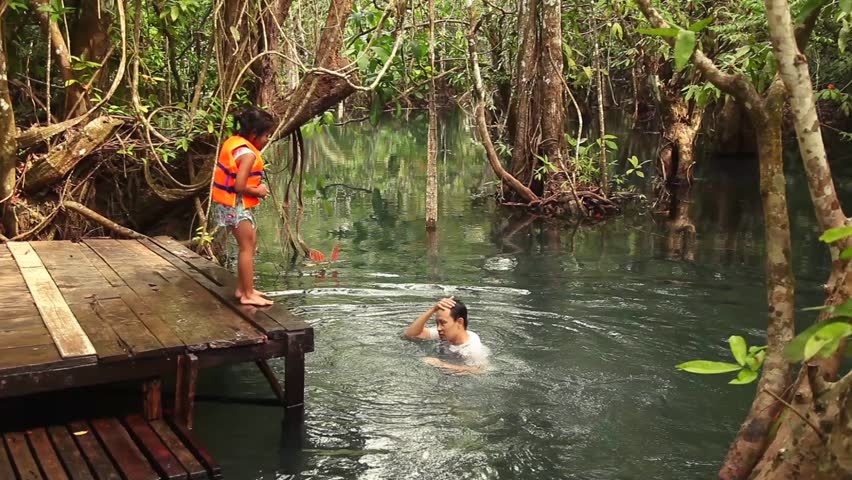 Dad and daughter  in the jungle