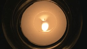 Burning yellow candle in perfect darkness.

This video clip was shot in 4K Ultra High-Definition and offers four times the resolution of Full HD.
