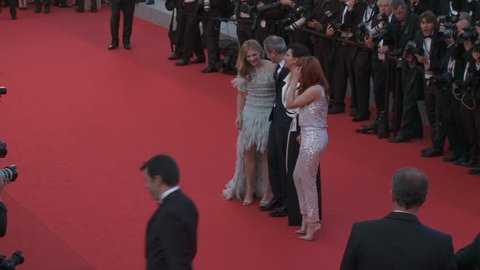 CANNES, FRANCE - MAY 2014: Kristen Stewart, Chloe Grace Moretz, Juliette Binoche and Olivier Assayas walk the red carpet for the premiere of "Sils Maria" at the 67th Cannes Film Festival.