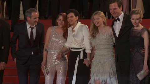 CANNES, FRANCE - MAY 2014: Kristen Stewart, Chloe Grace Moretz, Juliette Binoche and Olivier Assayas on the red carpet after the premiere of "Sils Maria" at the 67th Cannes Film Festival.