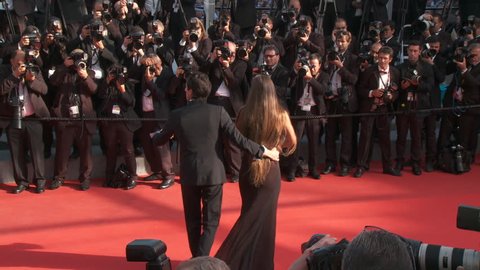 CANNES, FRANCE - MAY 2014: Adrien Brody and Lara Lieto on the red carpet for the closing ceremony at the 67th Cannes Film Festival.