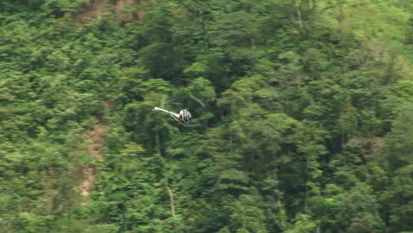 Closeup of helicopter making sharp turn