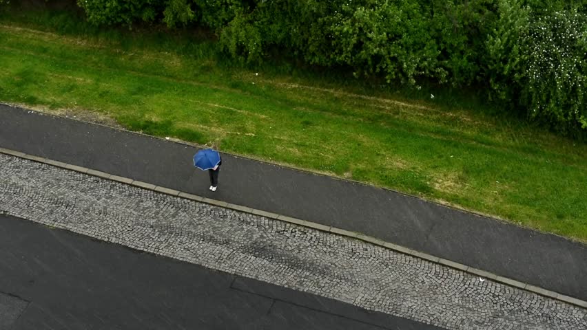 rain with road&nature and one person with umbrella 