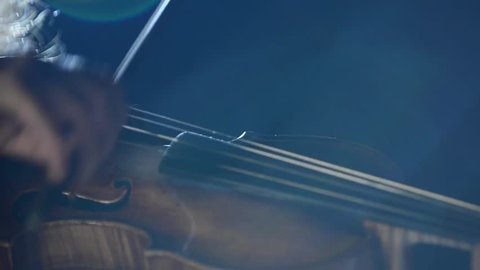 Close-up on violin with extra rosin on bow/Violin Close-up