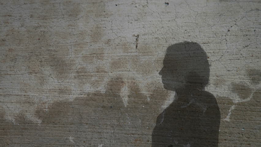 Vintage silhouette of a woman drinking water out of a water bottle.