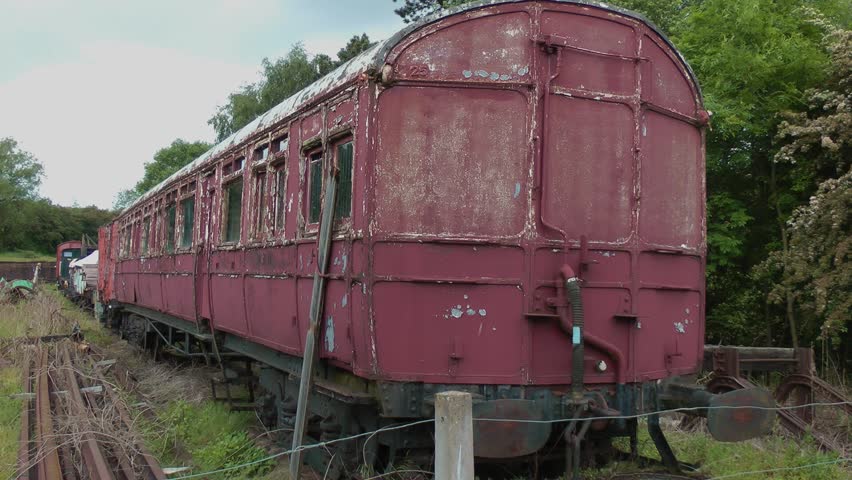 TELFORD LIGHT RAILWAY, SHROPSHIRE, ENGLAND - 1 JUNE 2014: Old abandoned railway carriage