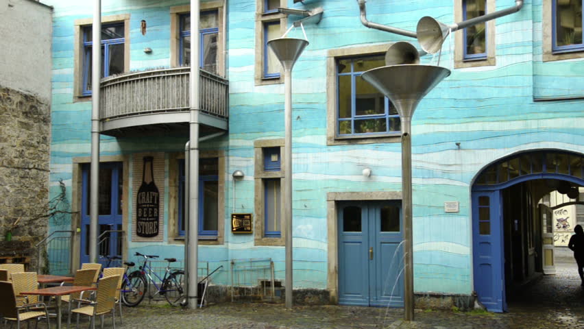 downpour in Kunsthofpasage of Dresden, Germany