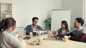 Business meeting about drone technology - Powered by Shutterstock - Get 15% off with code: PIKWIZARD15