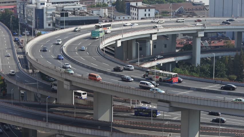 closeup of  freeway busy city rush hour heavy traffic jam highway Shanghai china,nanpu overpass interchange,Shanghai Skyline,Crowded Street. gh2_07331