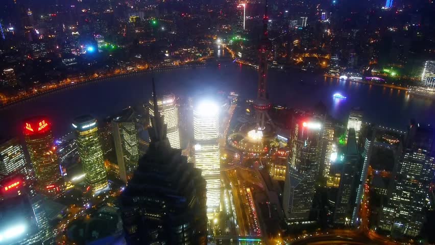 Elevated view of high-rise buildings with river at night in Shanghai,China.Jin Mao Tower(one of China