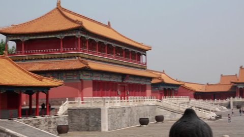 Tourists visiting the Forbidden City Palace in Beijing China